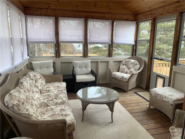 sunroom / solarium with lofted ceiling and wood ceiling