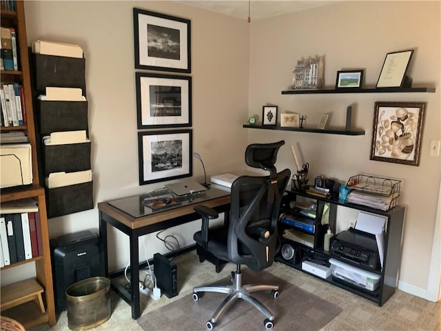 office with carpet floors and baseboards