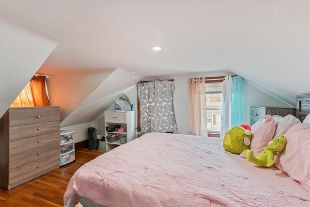 bedroom featuring recessed lighting, vaulted ceiling, and wood finished floors