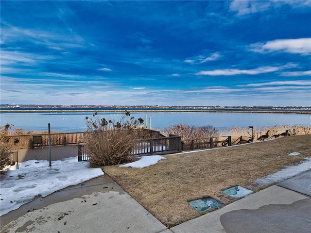 view of water feature featuring fence