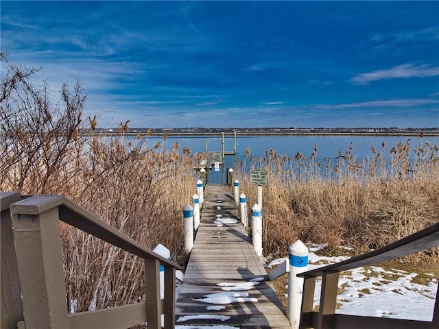 view of dock with a water view