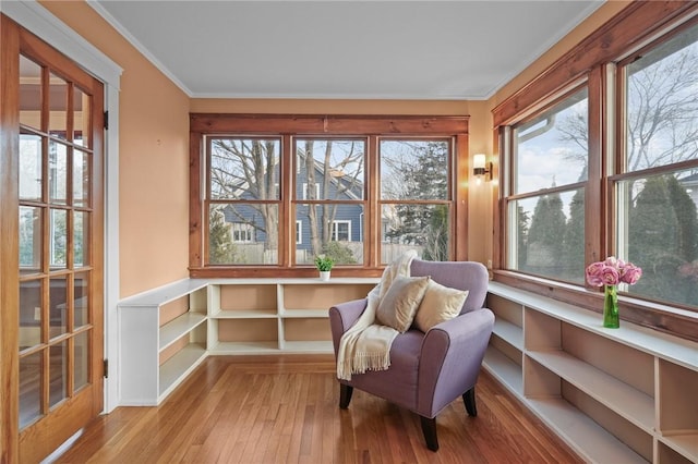 sunroom / solarium featuring a healthy amount of sunlight