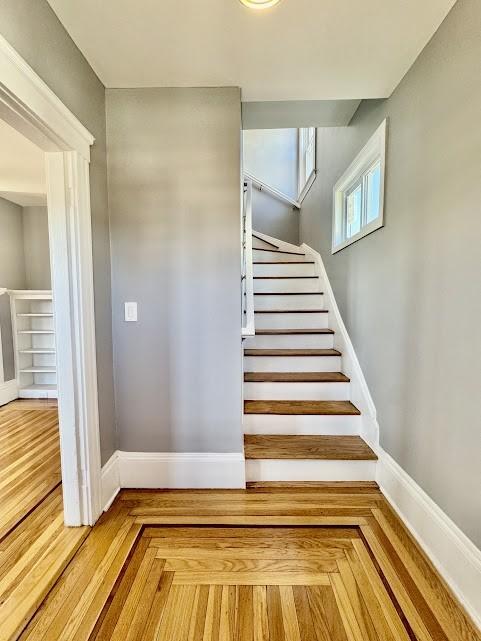 staircase with baseboards