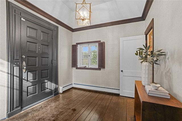 foyer with crown molding, a chandelier, baseboard heating, and dark wood finished floors