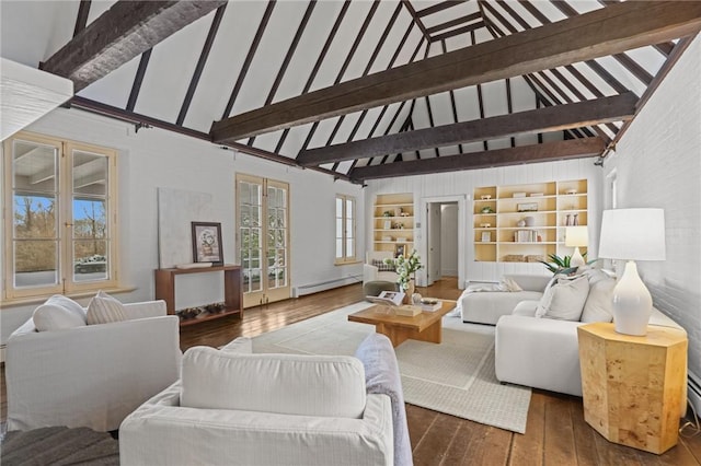 interior space featuring hardwood / wood-style flooring, a baseboard radiator, beamed ceiling, french doors, and built in shelves