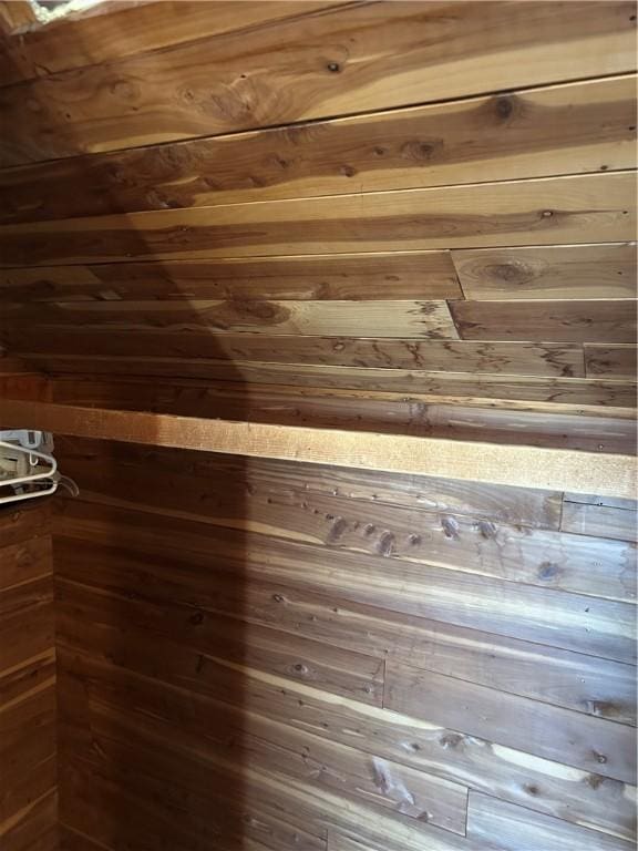 room details featuring wood walls