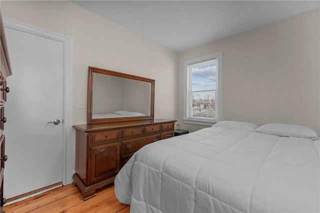 bedroom with light wood-style flooring