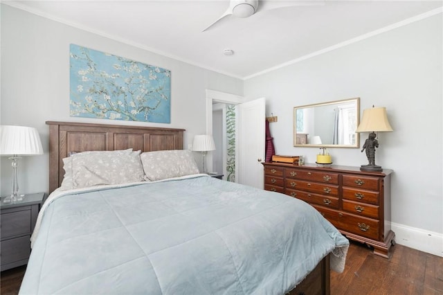 bedroom featuring ornamental molding, dark wood-style flooring, baseboards, and a ceiling fan