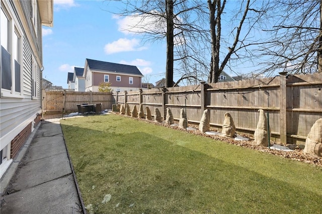 view of yard featuring a fenced backyard