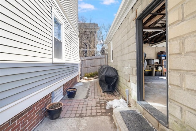 exterior space featuring a patio and fence