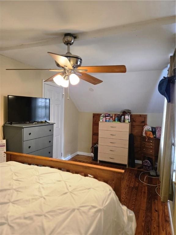 bedroom featuring lofted ceiling, wood finished floors, a ceiling fan, and baseboards