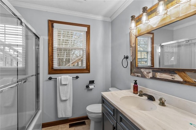 bathroom featuring crown molding, visible vents, toilet, vanity, and tile patterned flooring