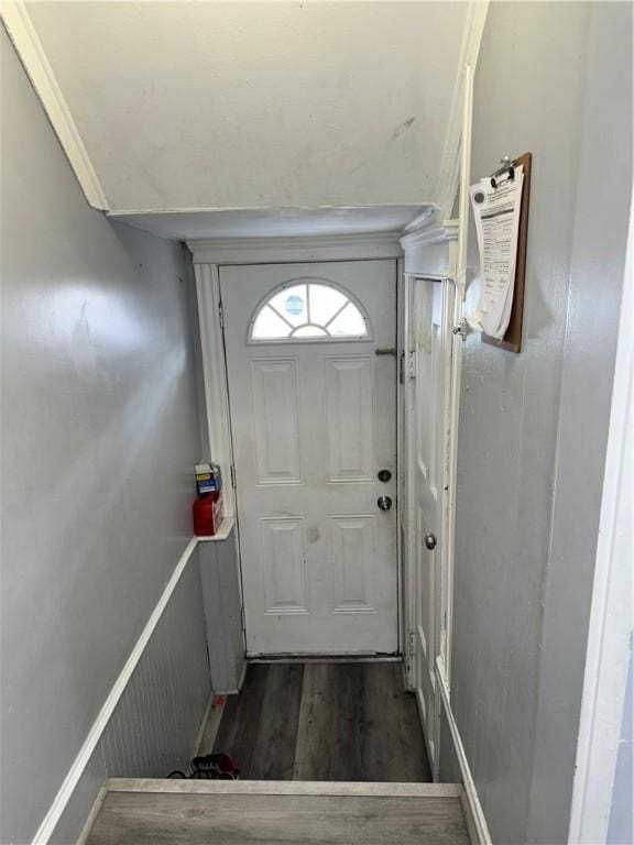 entryway with wood finished floors