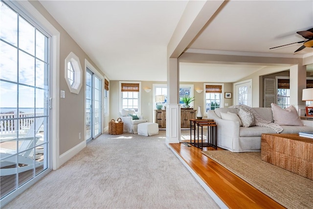 interior space with ceiling fan