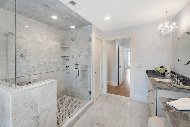 full bath with vanity, visible vents, baseboards, marble finish floor, and a stall shower