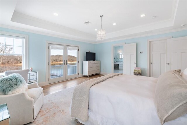 1040 Buttonwoods Ave, Warwick, RI 02886 - bedroom with a tray ceiling, access to exterior, ornamental molding, french doors, and recessed lighting