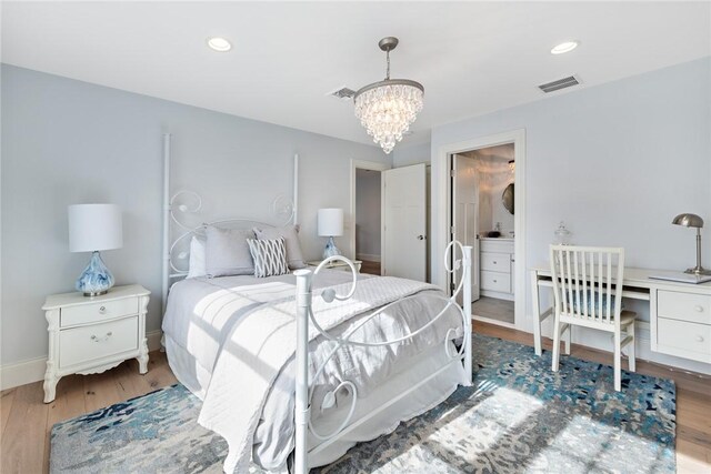 1040 Buttonwoods Ave, Warwick, RI 02886 - bedroom with a chandelier, wood finished floors, an office area, baseboards, and recessed lighting