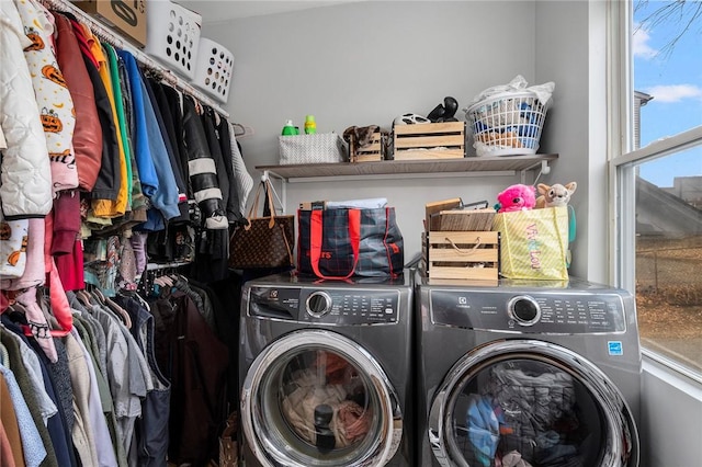 laundry room featuring laundry area and washing machine and dryer