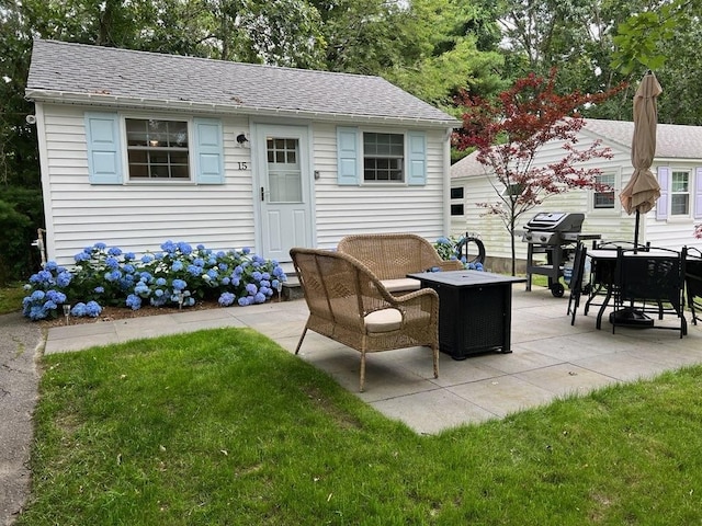 view of patio with a grill