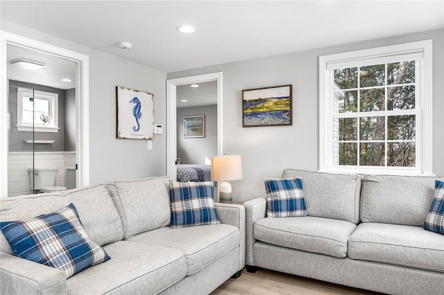 living room featuring recessed lighting and light wood-style floors