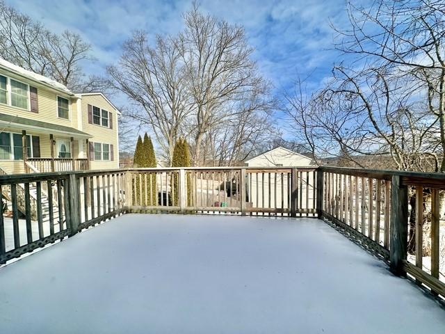 view of snow covered deck