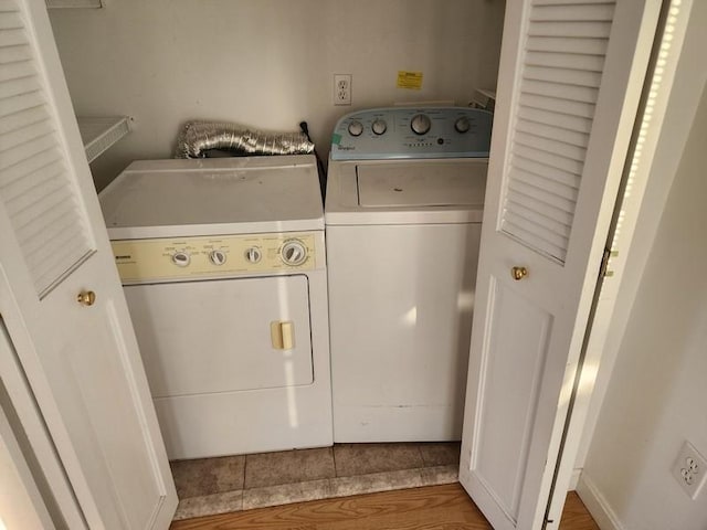 laundry area featuring laundry area and independent washer and dryer