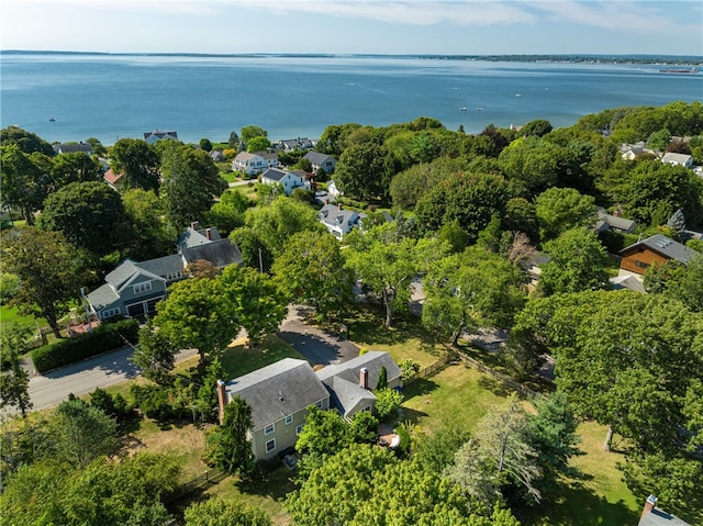 birds eye view of property with a residential view and a water view