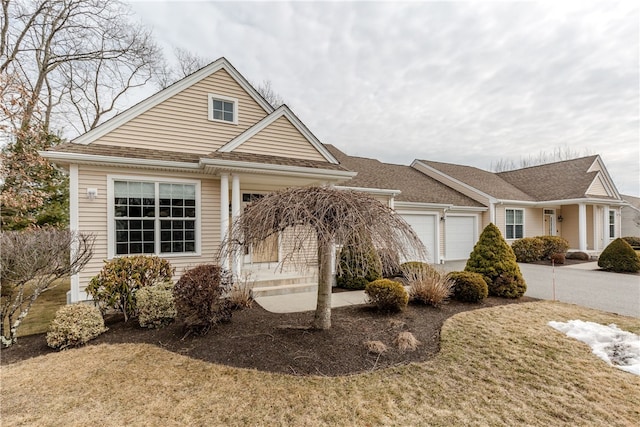 view of front of property with an attached garage and driveway