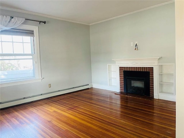 unfurnished living room featuring built in shelves, a fireplace, a baseboard radiator, ornamental molding, and wood finished floors