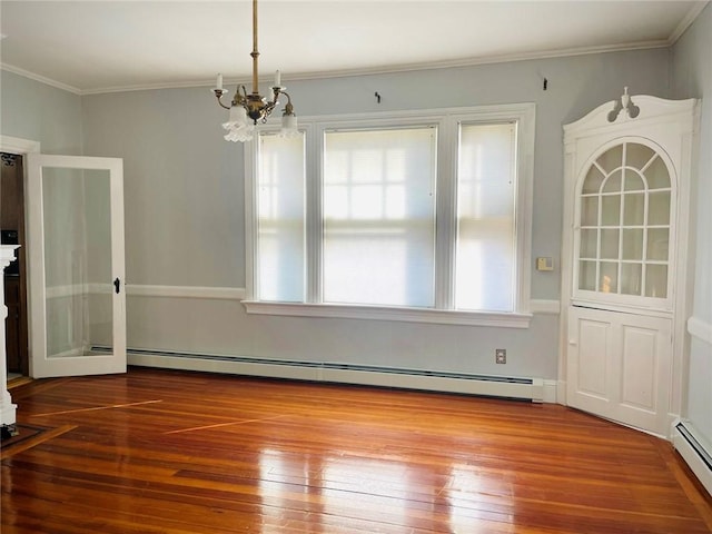 unfurnished dining area with a baseboard heating unit, hardwood / wood-style floors, and ornamental molding