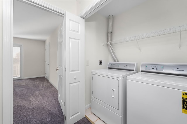 washroom featuring light carpet, laundry area, baseboards, and independent washer and dryer