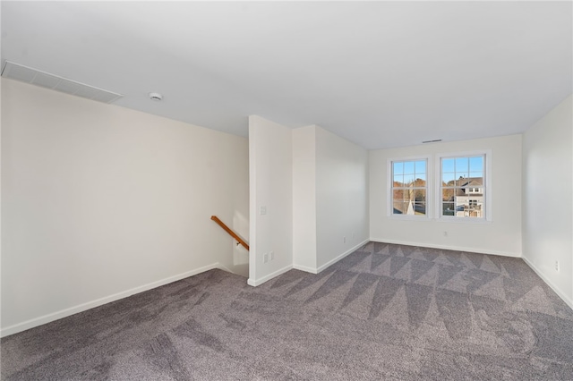 704 Fairway Dr Unit 704, Middletown, RI 02842 - spare room featuring dark colored carpet and baseboards