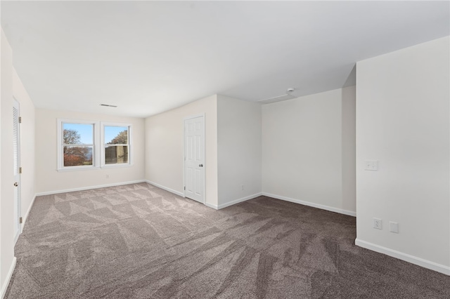 704 Fairway Dr Unit 704, Middletown, RI 02842 - spare room with carpet flooring and baseboards