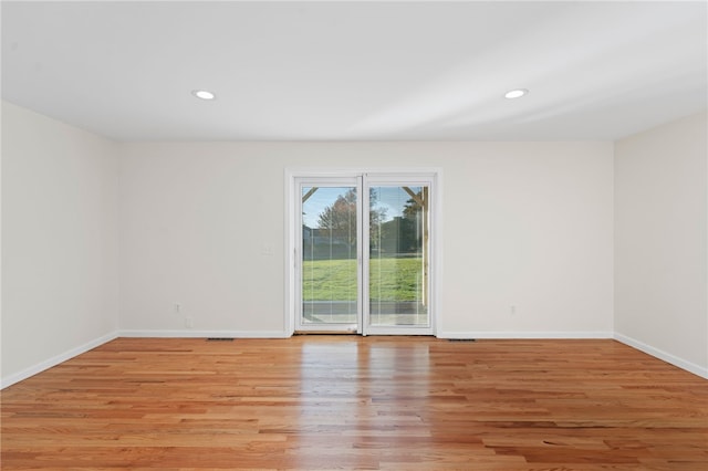 704 Fairway Dr Unit 704, Middletown, RI 02842 - unfurnished room with baseboards, light wood-type flooring, and recessed lighting
