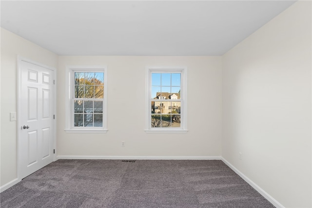 704 Fairway Dr Unit 704, Middletown, RI 02842 - unfurnished room featuring carpet, plenty of natural light, and baseboards