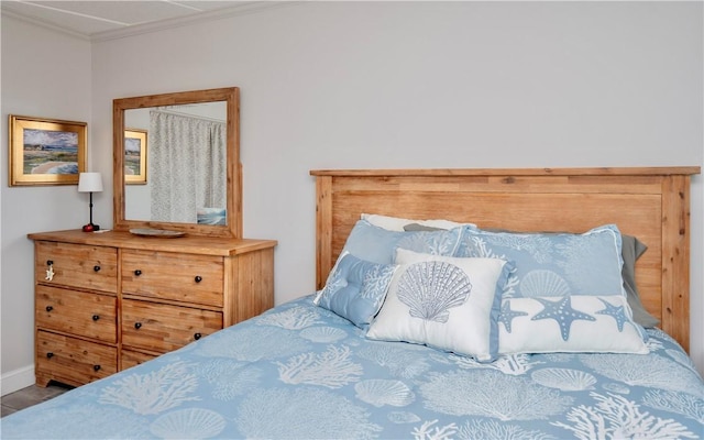 bedroom featuring crown molding