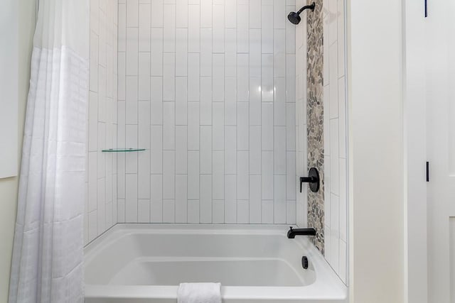 full bath featuring shower / tub combo with curtain