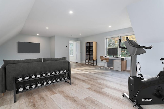 interior space featuring recessed lighting, multiple windows, and wood finished floors