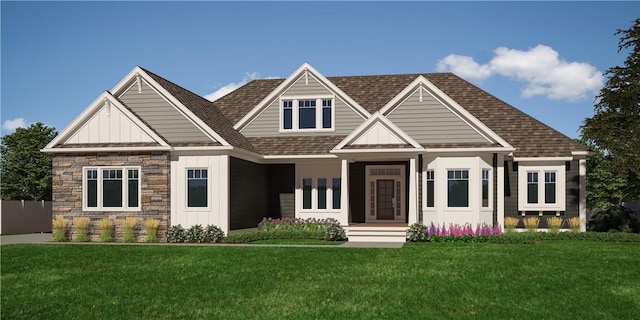 craftsman-style house featuring a shingled roof, board and batten siding, and a front lawn