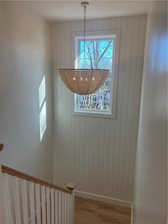 interior details with baseboards and wood finished floors