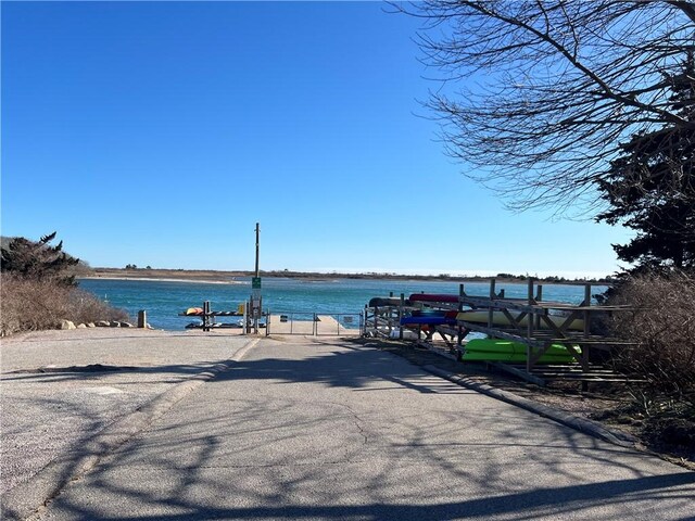 property view of water with a dock