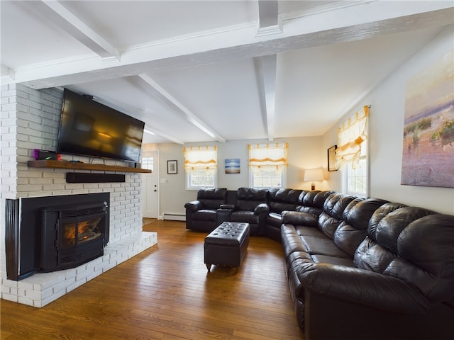 living room featuring plenty of natural light, hardwood / wood-style flooring, a baseboard radiator, and beam ceiling