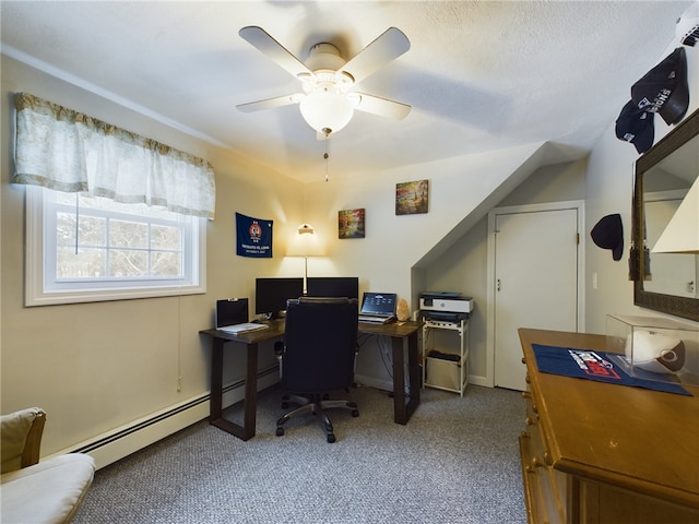 office area featuring carpet floors, a baseboard heating unit, and a ceiling fan