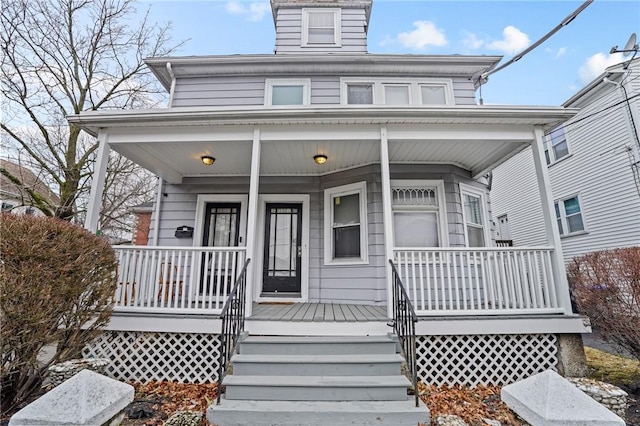 traditional style home featuring a porch