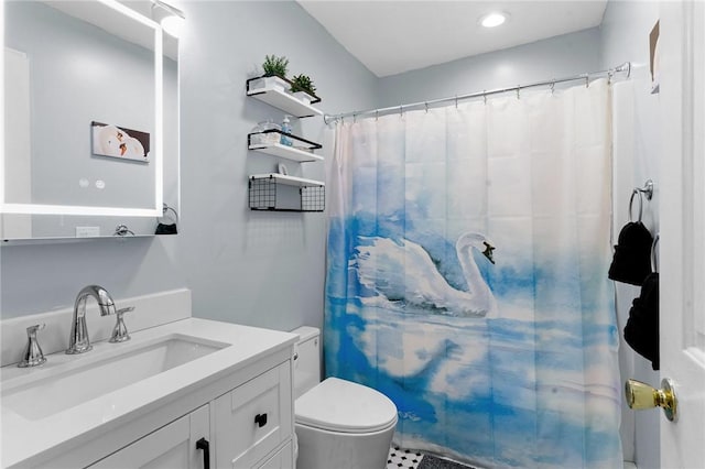 full bath featuring toilet, a shower with curtain, and vanity