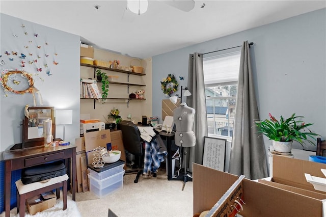 office space with carpet and ceiling fan