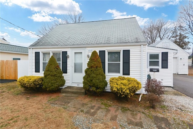 view of front of house featuring fence