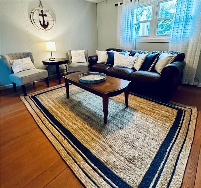 living room with wood finished floors