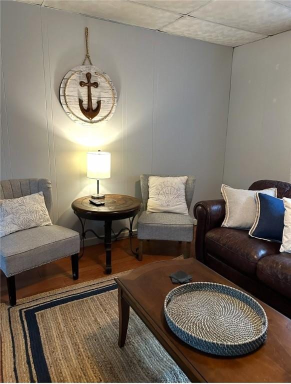 sitting room featuring wood finished floors