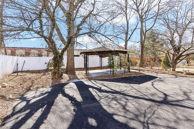 view of yard with a gazebo and a fenced backyard